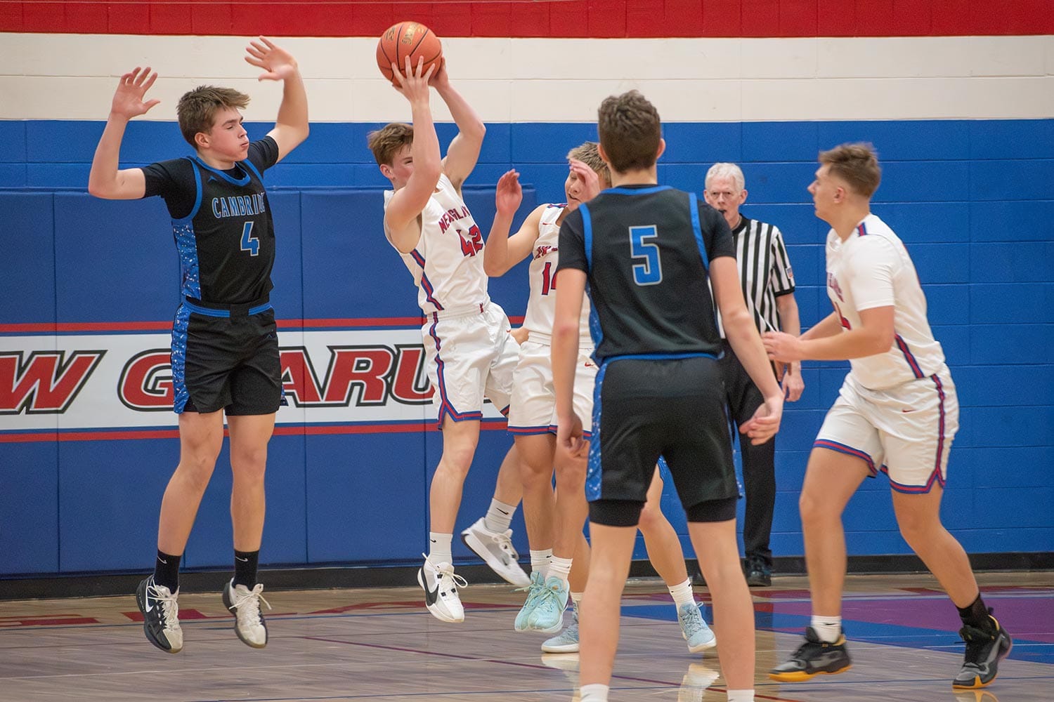 New Glarus Knights Top Cambridge in Key Conference Win